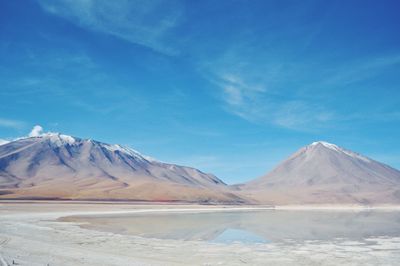 Tranquil sunny landscape against blue sky