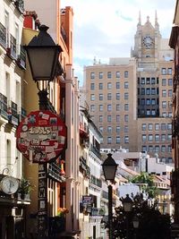 View of buildings in city against sky