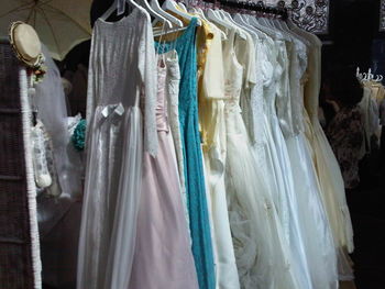 Close-up of clothes hanging at store