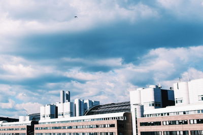 Buildings in city against sky