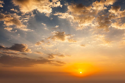 Scenic view of dramatic sky during sunset