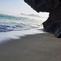 Scenic view of beach against sky