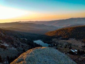 Scenic view of landscape against sky during sunset