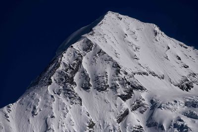 Snow covered mountain against sky