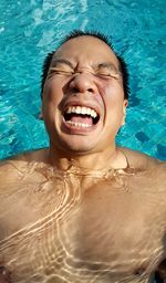 High angle view of man in swimming pool