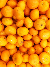 Full frame shot of oranges in market