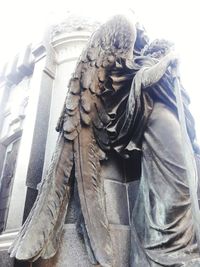 Low angle view of angel statue