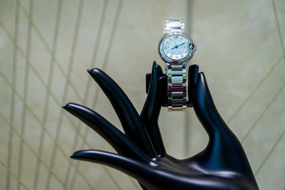 Close-up of wristwatch on mannequin