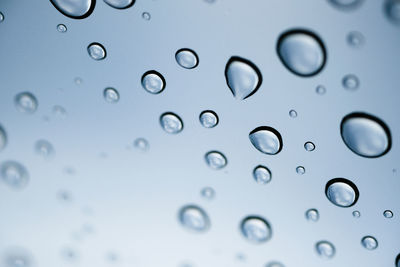 Full frame shot of wet glass window