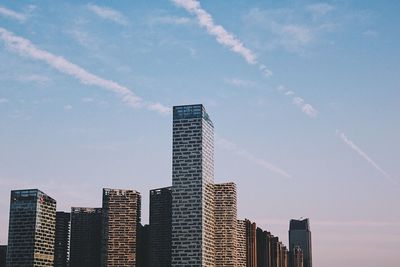 Low angle view of skyscrapers against sky