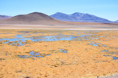 Landscape or mountains and lagoon at atacama desert in chile