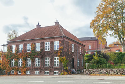 Buildings in city against sky