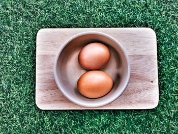 High angle view of eggs in plate on table