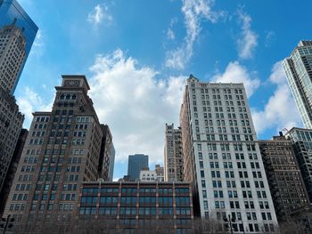 Low angle view of modern buildings against sky in chicago