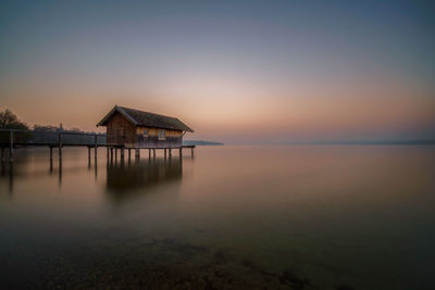 Scenic view of sea against sky at sunset