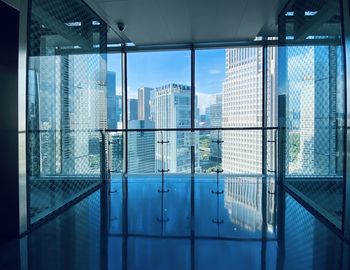 View of swimming pool against buildings