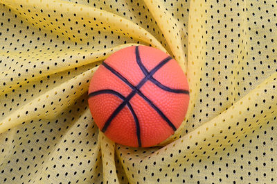 High angle view of basketball on fabric