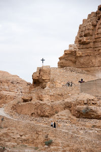 People on rock formation