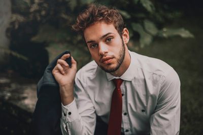 Portrait of young man looking away