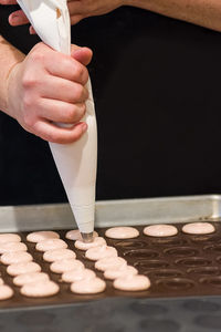 Close-up of person preparing food