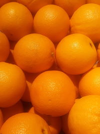 Full frame shot of oranges in market