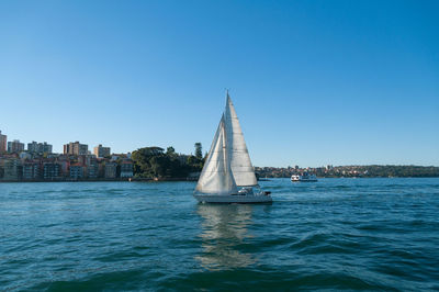 Sail boat in the harbour, summer travel leisure background. yachting sport. sailing boat