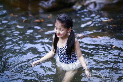 Portrait of girl in lake