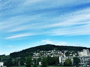 Aerial view of townscape against sky