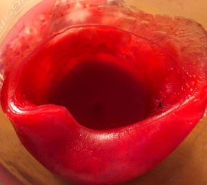 Close-up of red drink in glass