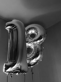 Low angle view of inflatable balloons on ceiling