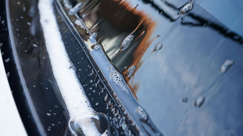 High angle view of wet car during winter