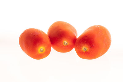 High angle view of oranges on white background