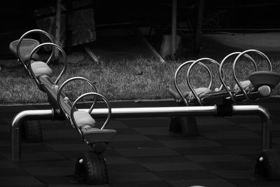 Empty bench in city