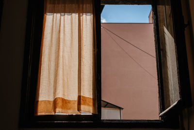 Low angle view of window in house