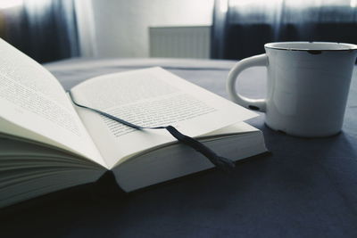 Close-up of coffee cup on table