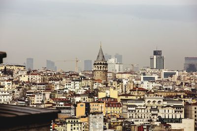 Aerial view of townscape against clear sky