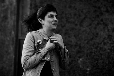 Portrait of woman wearing denim jacket cold weather