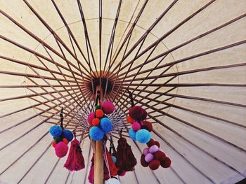 High angle view of multi colored umbrella on wood