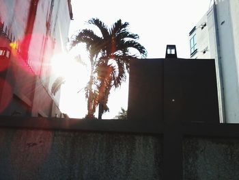 Low angle view of built structure at sunset