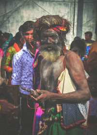 Portrait of people standing outdoors