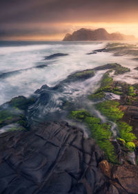 Scenic view of sea against sky during sunset