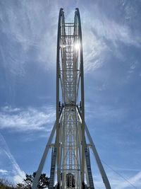 Low angle view of metallic structure against sky