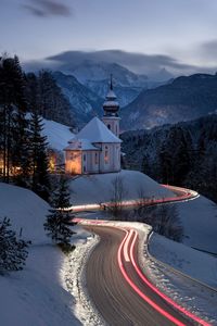 Light trails on road during winter