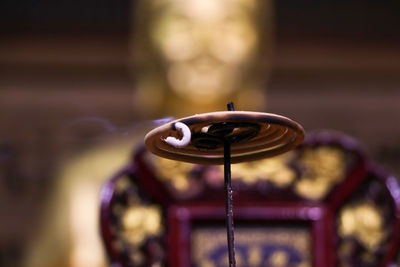 Close-up of illuminated incense