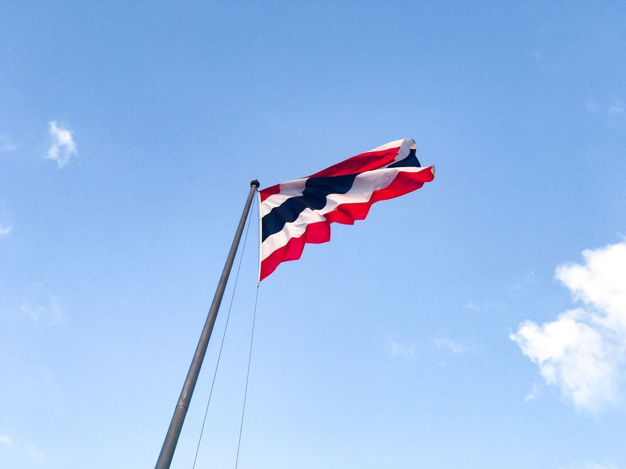 low angle view, flag, patriotism, blue, red, no people, sky, day, outdoors, nature