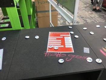 High angle view of information sign on table