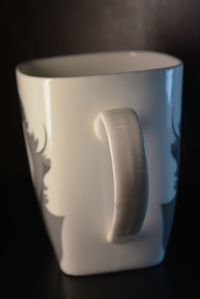 Close-up of coffee cup on table