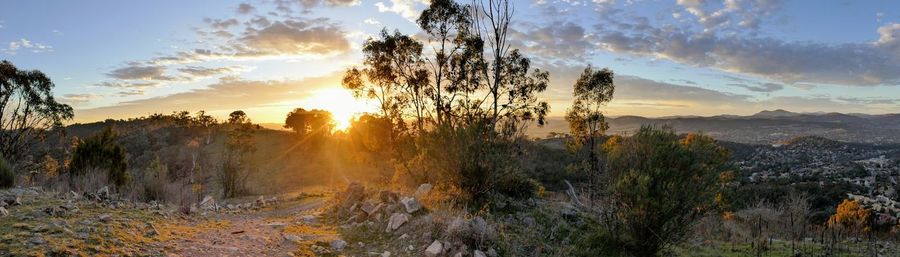 Panoramic view of landscape against sky during sunset