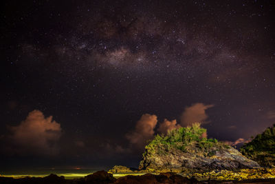 Low angle view of star field against sky at night