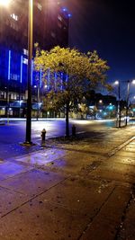 Illuminated street light at night